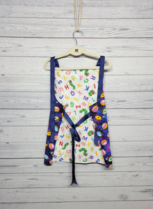 Children's Apron Reversible: Space Donuts & Caterpillars with Alphabet