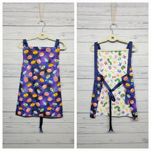 Load image into Gallery viewer, Children&#39;s Apron Reversible: Space Donuts &amp; Caterpillars with Alphabet