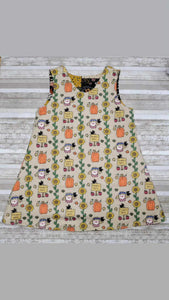 Fall patchwork themed infant and toddler reversible dresses.