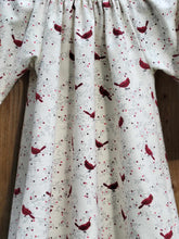 Load image into Gallery viewer, Red Cardinal birds on vines. Infant, toddler, girls peasant style dress. Light Ivory cream background on soft cotton flannel fabric.