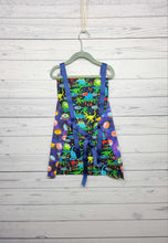 Load image into Gallery viewer, Children&#39;s Apron Reversible: Space Donuts &amp; Dinosaurs