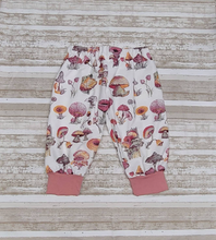 Load image into Gallery viewer, Cottage core mushrooms, soft Infant &amp; Toddler Harem style lounge pants.  Cute unisex flannel pants are perfect for winter holiday activities